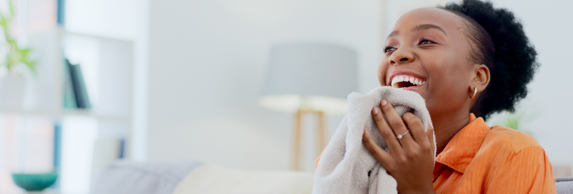 Woman Happy About Laundry Delivery 1920X650
